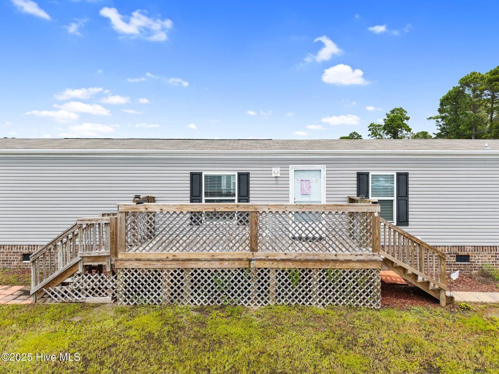 Photo of 930 Pineclair Drive SW, Calabash, NC 28467 (MLS # 100526745)