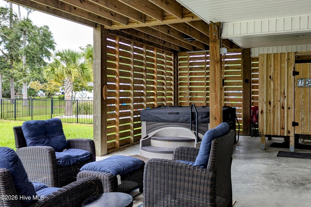 Photo of 317 NE 60th Street, Oak Island, NC 28465 (MLS # 100608390)