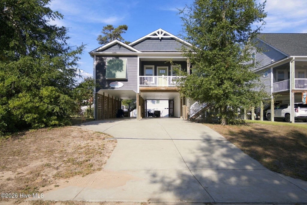 Photo of 317 NE 60th Street, Oak Island, NC 28465 (MLS # 100608390)