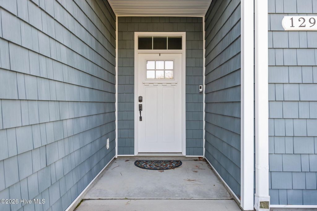 Photo of 129 NW 11th Street, Oak Island, NC 28465 (MLS # 100565056)