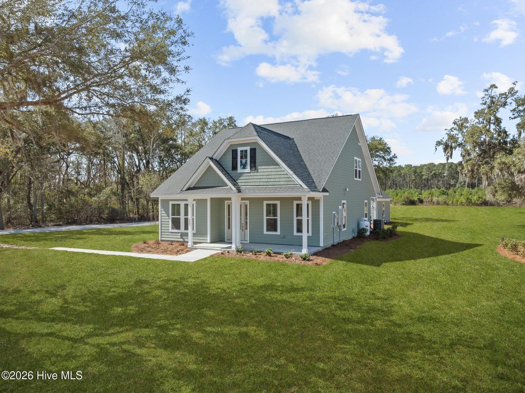 Photo of 1007 Beauvoir Drive NW, Calabash, NC 28467 (MLS # 100552796)