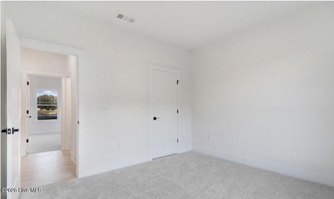 Tiny photo for 1009 Wood Creek Road NE, Leland, NC 28451 (MLS # 100563346)