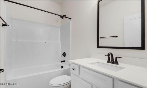 Tiny photo for 1009 Wood Creek Road NE, Leland, NC 28451 (MLS # 100563346)