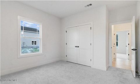 Tiny photo for 1009 Wood Creek Road NE, Leland, NC 28451 (MLS # 100563346)