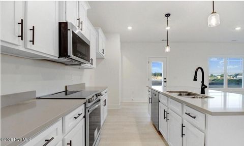 Tiny photo for 1009 Wood Creek Road NE, Leland, NC 28451 (MLS # 100563346)