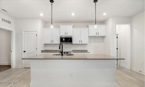 Tiny photo for 1009 Wood Creek Road NE, Leland, NC 28451 (MLS # 100563346)