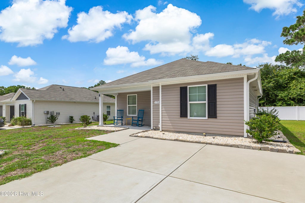 Photo of 1718 Whispering Pine Street SW, Ocean Isle Beach, NC 28469 (MLS # 100599848)