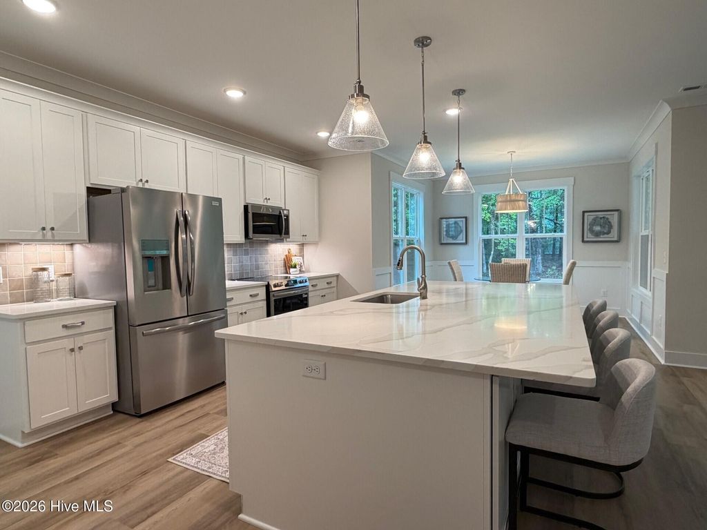 Photo of 227 Hickory Lane, Hampstead, NC 28443 (MLS # 100542700)