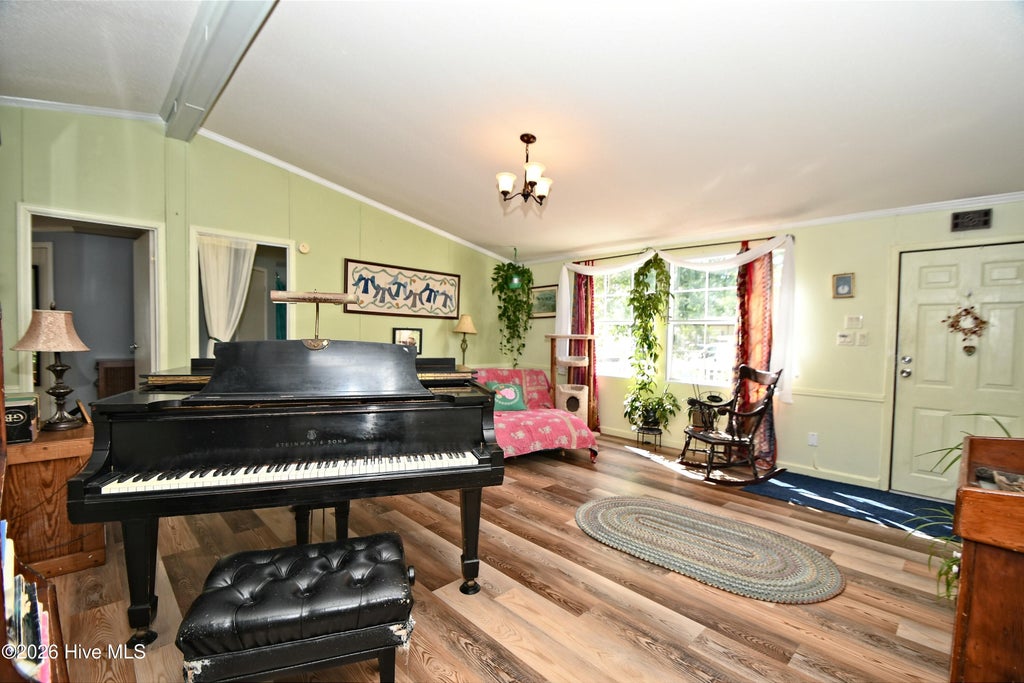 Photo of 907 Palmer Drive, Carolina Shores, NC 28467 (MLS # 100610261)