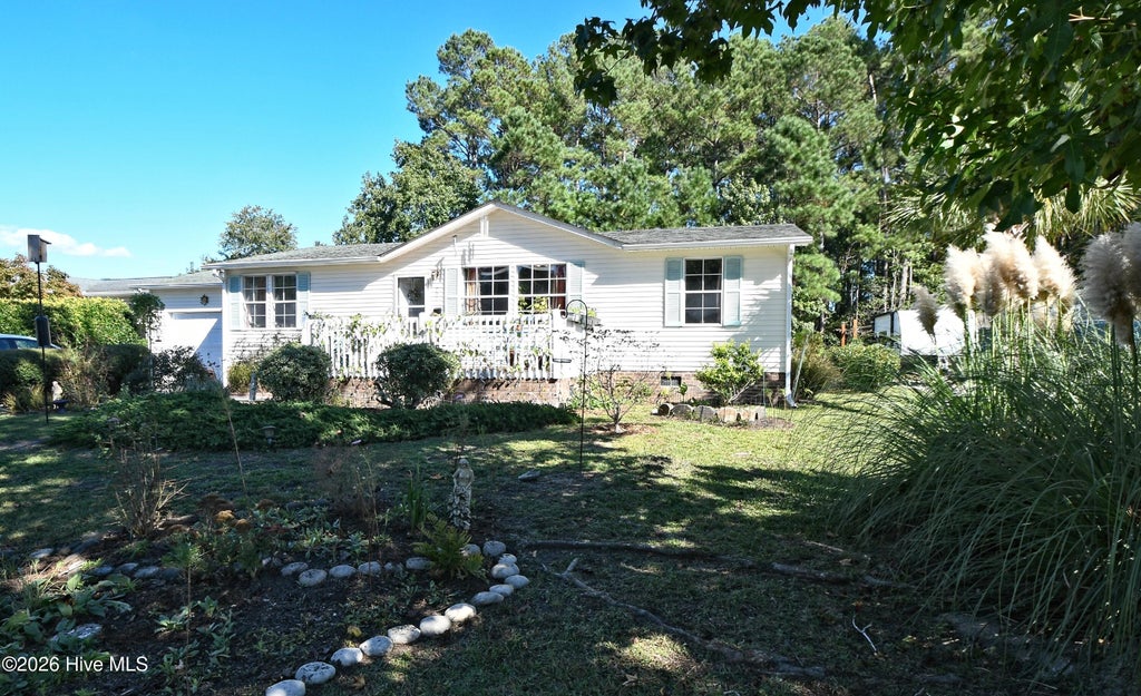 Photo of 907 Palmer Drive, Carolina Shores, NC 28467 (MLS # 100610261)