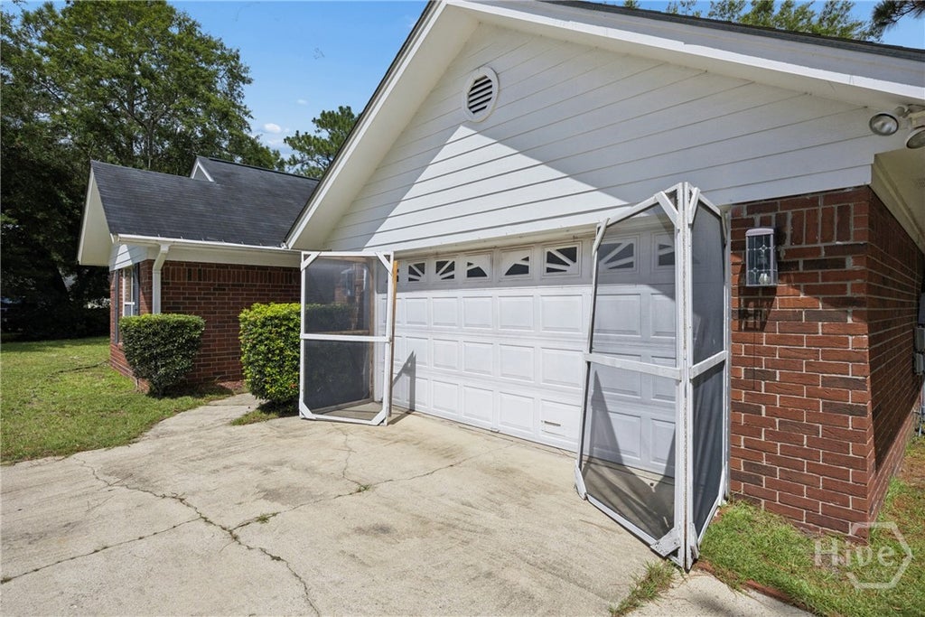 Photo of 940 Hunters Run Road, Hinesville, GA 31313 (MLS # SA364231)