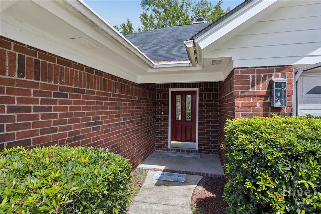 Photo of 940 Hunters Run Road, Hinesville, GA 31313 (MLS # SA364231)