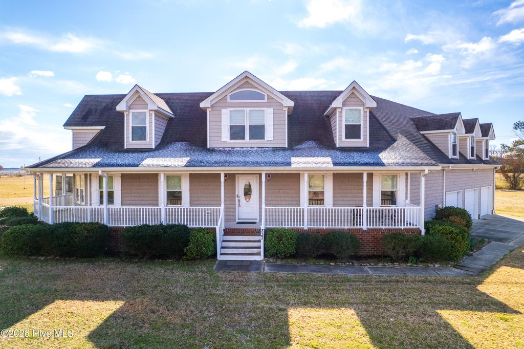 Photo of 337 Woodleigh Road, Knotts Island, NC 27950 (MLS # 100554458)
