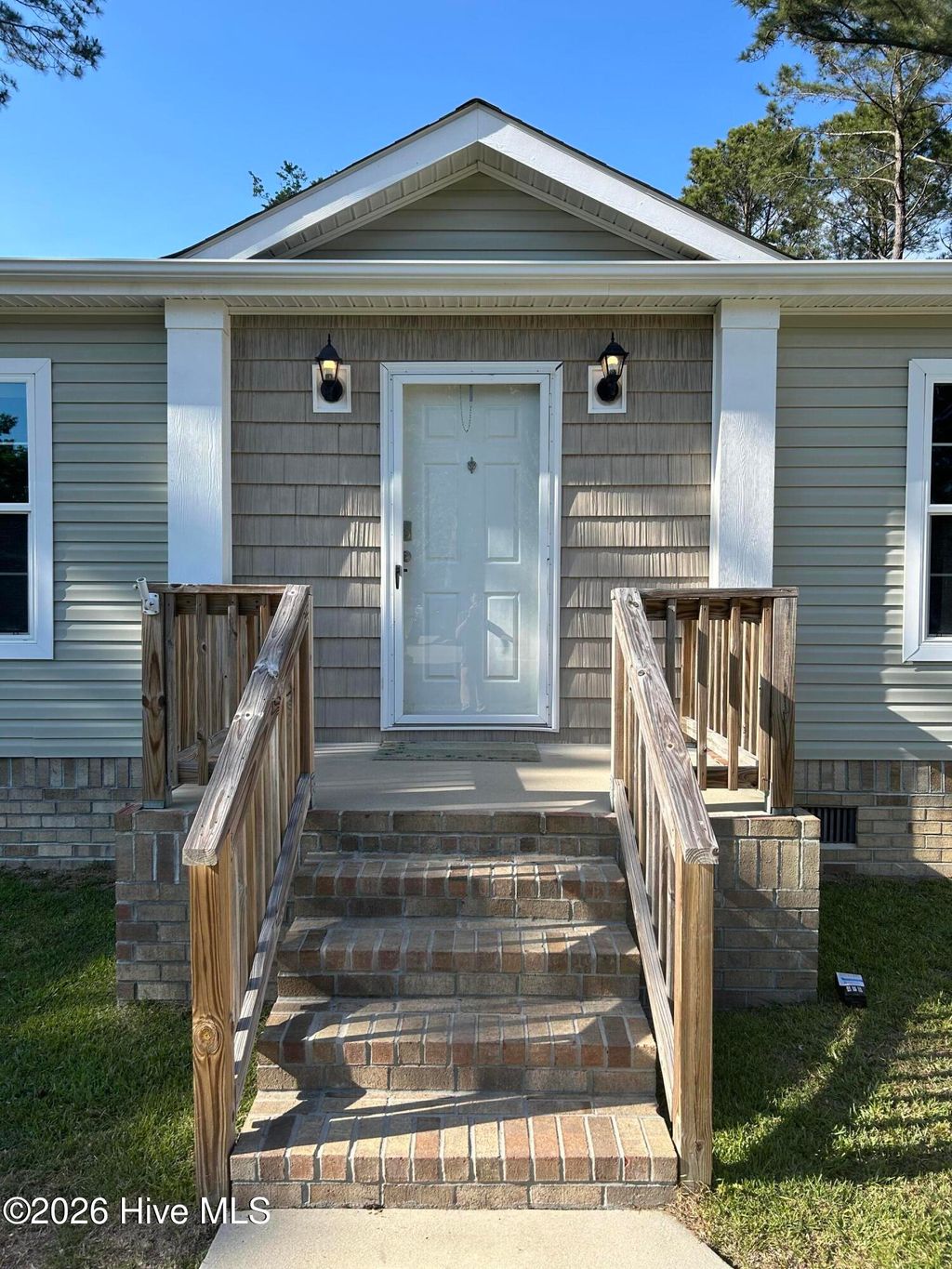 Photo of 857 Nicholas Drive SW, Carolina Shores, NC 28467 (MLS # 100559246)