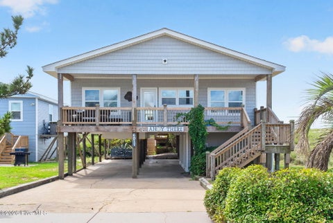 Photo of 6011 W Beach Drive, Oak Island, NC 28465 (MLS # 100602911)