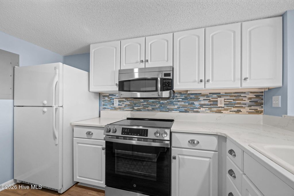 Photo of 10300 Coast Guard Road #D209, Emerald Isle, NC 28594 (MLS # 100554625)