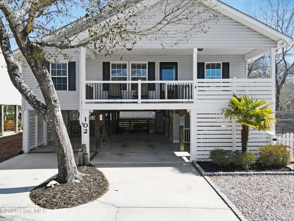 Photo of 102 NE 21st Street, Oak Island, NC 28465 (MLS # 100557408)