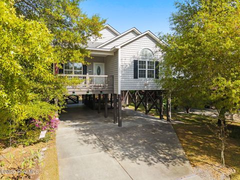 Photo of 116 NW 2nd Street, Oak Island, NC 28465 (MLS # 100566987)