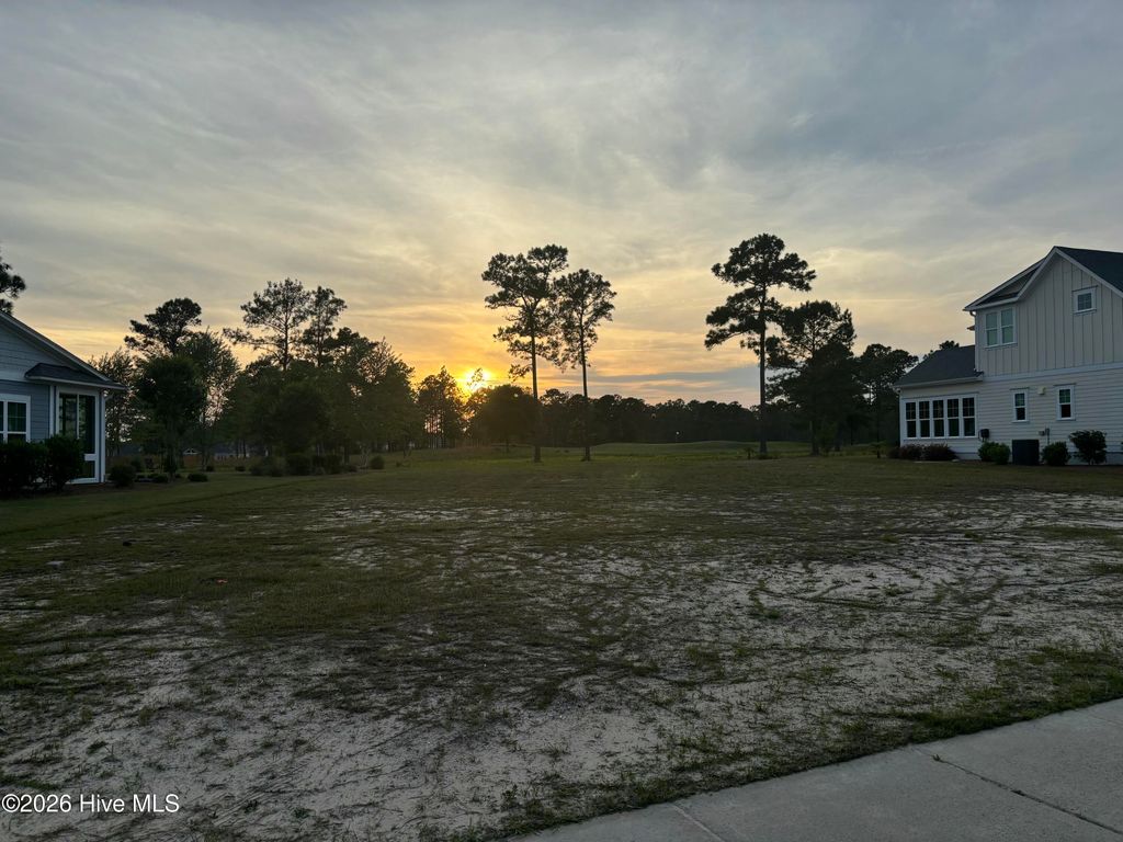 Photo of 8719 Compass Pointe West Wynd NE, Leland, NC 28451 (MLS # 100570040)