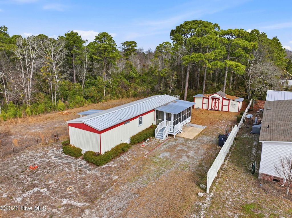 Photo of 4812 Coastal Drive SE, Southport, NC 28461 (MLS # 100552656)
