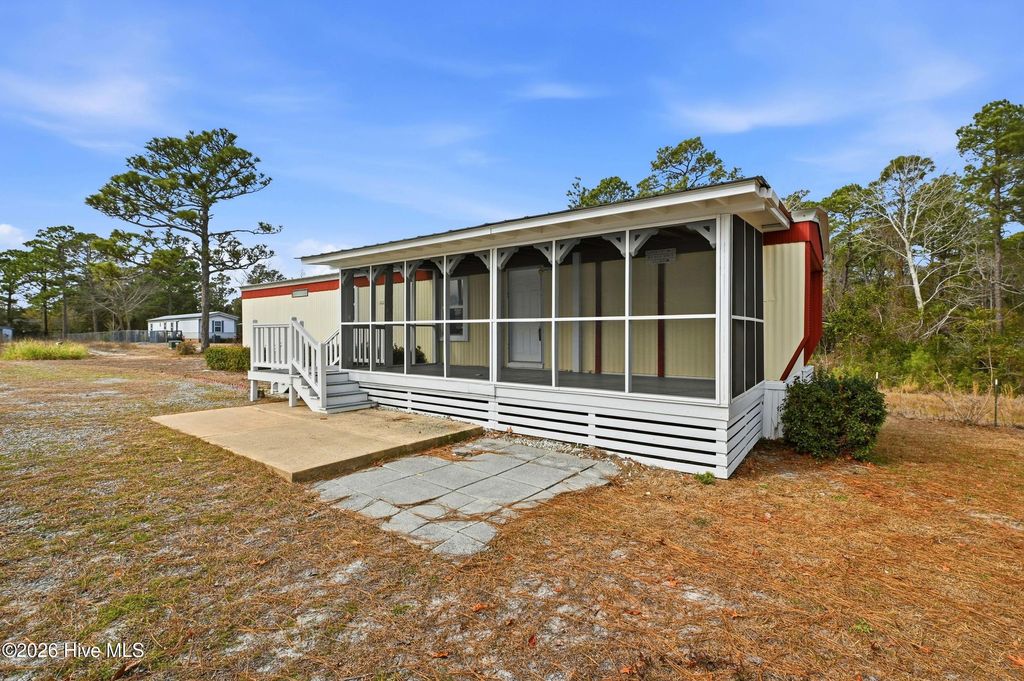 Photo of 4812 Coastal Drive SE, Southport, NC 28461 (MLS # 100552656)