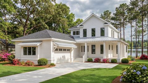Photo of 143 Halcyon Drive Drive, Hampstead, NC 28443 (MLS # 100571777)