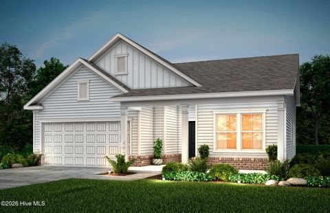 Photo of 1034 River Marsh Path SE, Southport, NC 28461 (MLS # 100565632)