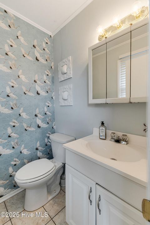 Tiny photo for 139 NE 39th Street, Oak Island, NC 28465 (MLS # 100573855)