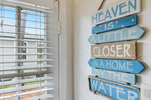 Tiny photo for 139 NE 39th Street, Oak Island, NC 28465 (MLS # 100573855)