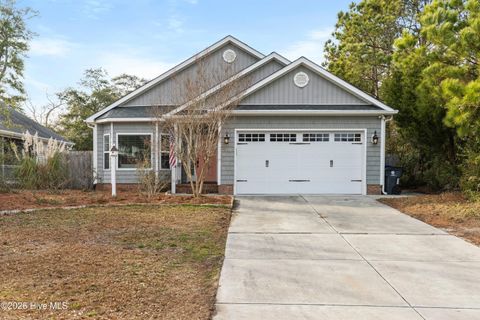 Photo of 333 NE 55th Street, Oak Island, NC 28465 (MLS # 100548789)