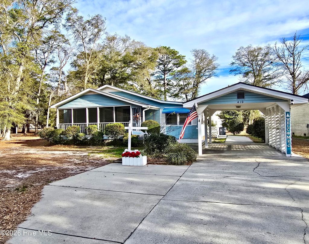 Photo of 410 Water Oak Wynd SW, Sunset Beach, NC 28468 (MLS # 100546572)