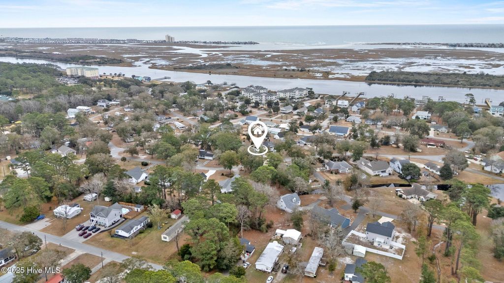 Photo of 410 Water Oak Wynd SW, Sunset Beach, NC 28468 (MLS # 100546572)