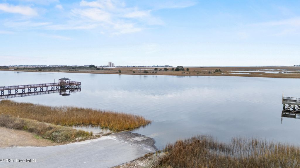 Photo of 410 Water Oak Wynd SW, Sunset Beach, NC 28468 (MLS # 100546572)