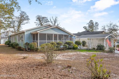 Photo of 410 Water Oak Wynd SW, Sunset Beach, NC 28468 (MLS # 100546572)