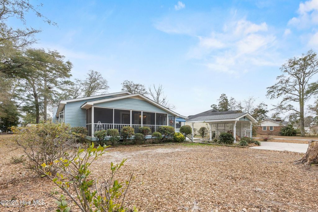 Photo of 410 Water Oak Wynd SW, Sunset Beach, NC 28468 (MLS # 100546572)