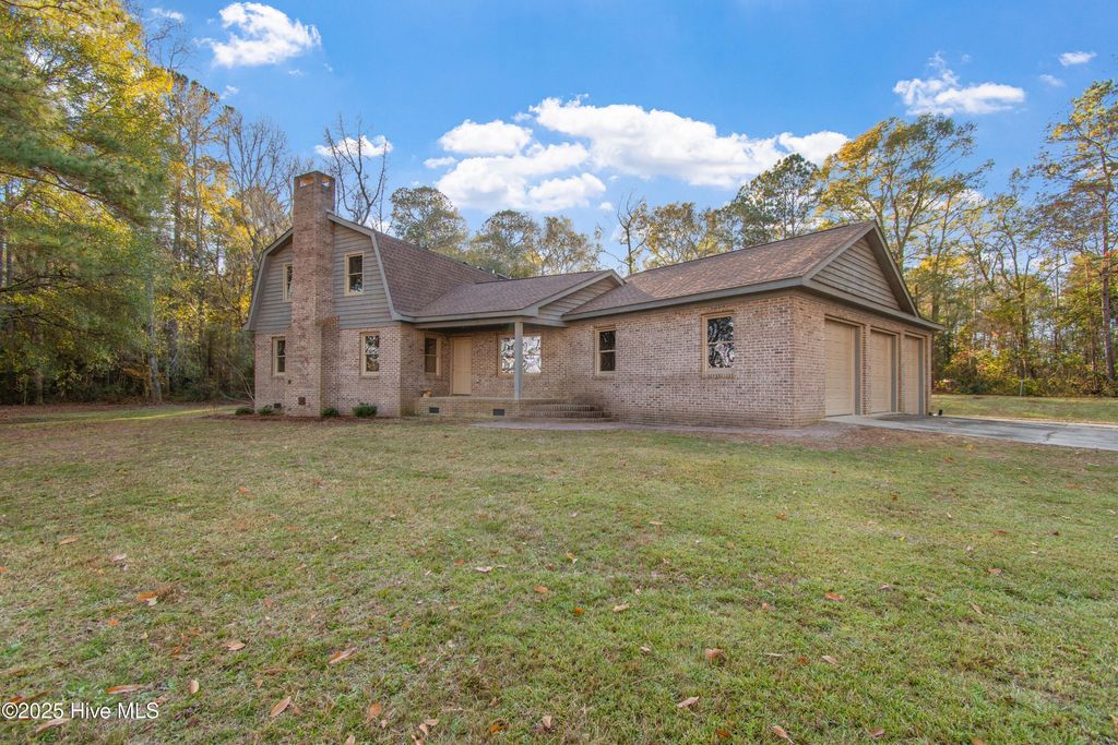 Photo of 50 Irvin Enzor Road S, Fair Bluff, NC 28439 (MLS # 100544820)