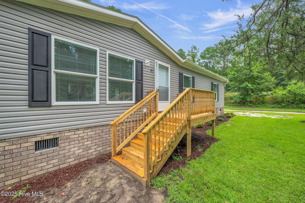 Photo of 97 Bridgeside Road, Rocky Point, NC 28457 (MLS # 100551764)