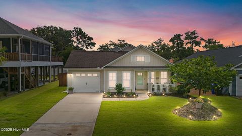 Photo of 126 NW 14th Street, Oak Island, NC 28465 (MLS # 100548300)
