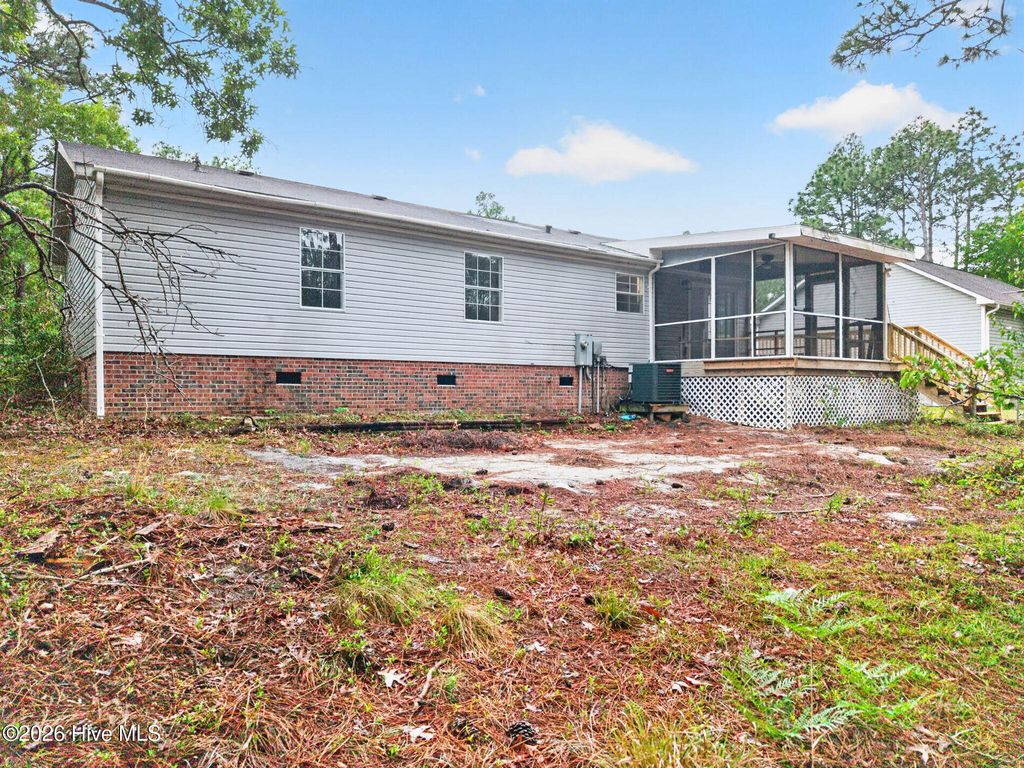 Photo of 1681 Navaho Road, Southport, NC 28461 (MLS # 100573330)