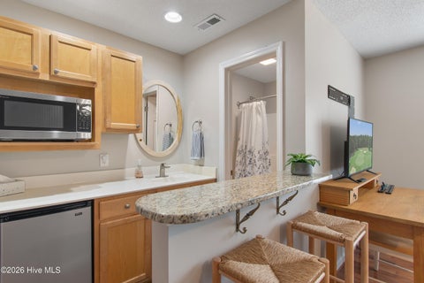 Tiny photo for 3350 Club Villas Drive # 1004, Southport, NC 28461 (MLS # 100591739)