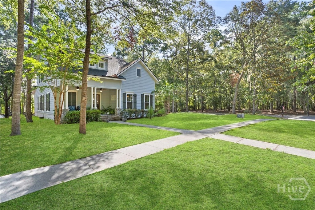Photo of 165 Blackjack Oak Drive E, Richmond Hill, GA 31324 (MLS # SA361629)