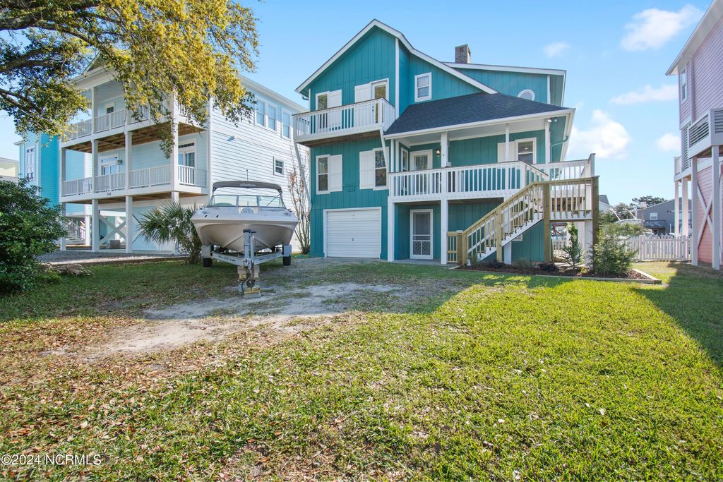 Photo of 144 Tuna Drive, Holden Beach, NC 28462 (MLS # 100437892)