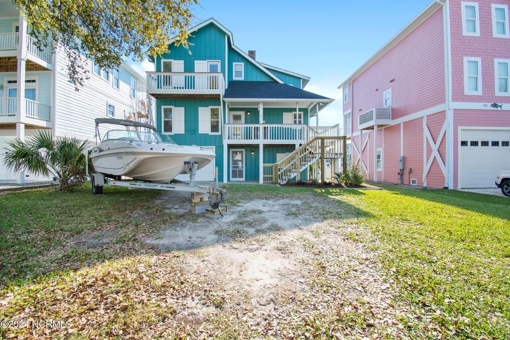 Photo of 144 Tuna Drive, Holden Beach, NC 28462 (MLS # 100437892)