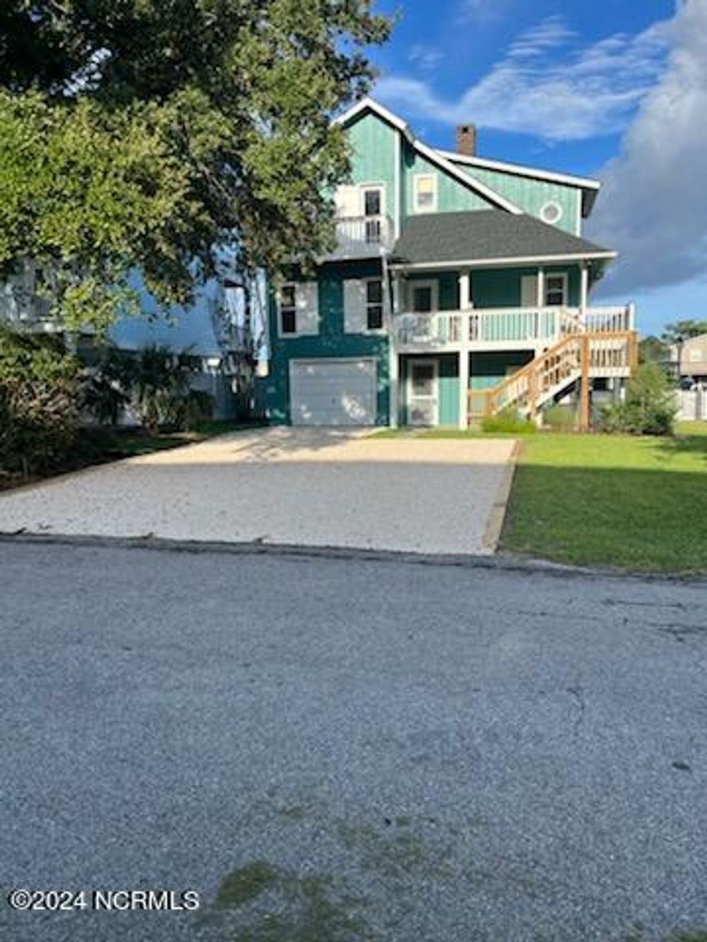 Photo of 144 Tuna Drive, Holden Beach, NC 28462 (MLS # 100437892)