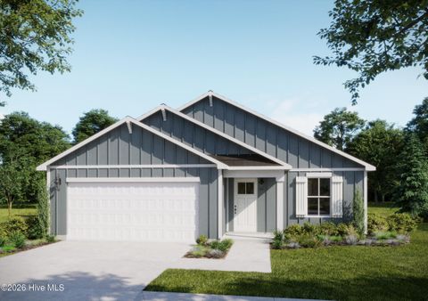 Photo of 778 Pelican Cove Way SE #303, Southport, NC 28461 (MLS # 100555314)