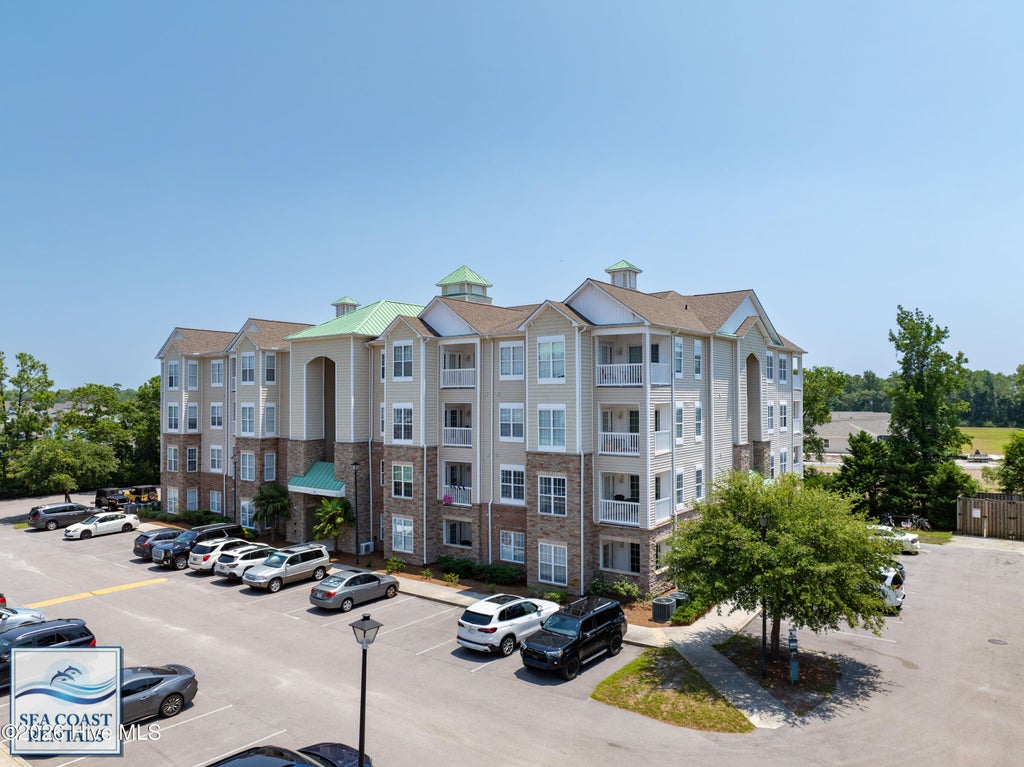 Photo of 100 Gateway Condos Drive #113, Surf City, NC 28445 (MLS # 100612845)
