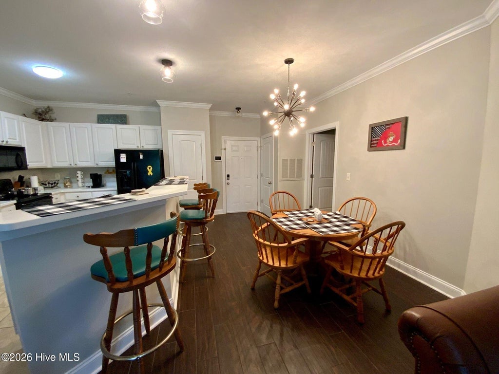 Photo of 100 Gateway Condos Drive #113, Surf City, NC 28445 (MLS # 100612845)