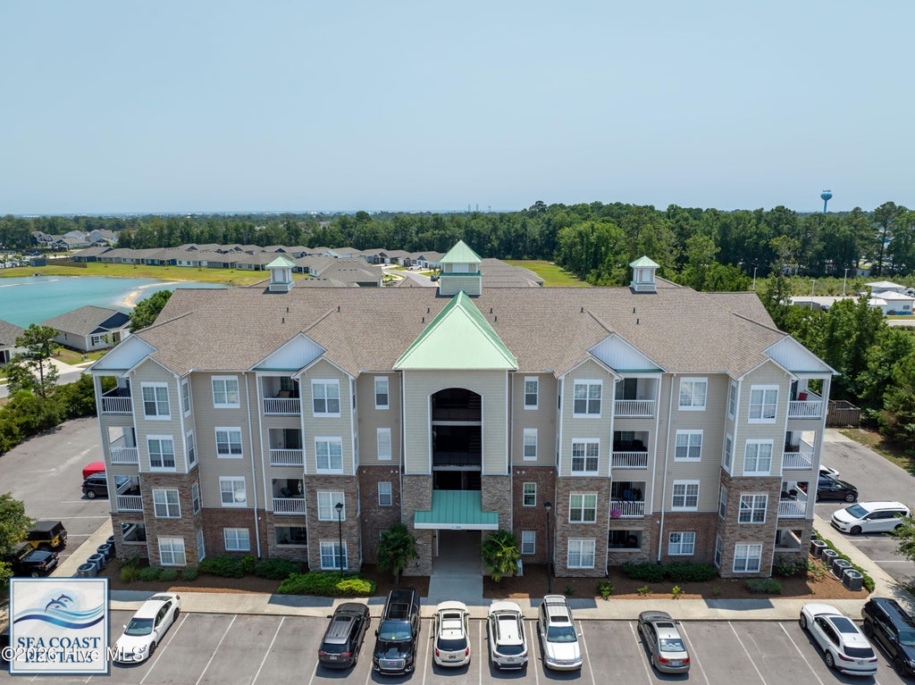 Photo of 100 Gateway Condos Drive #113, Surf City, NC 28445 (MLS # 100612845)