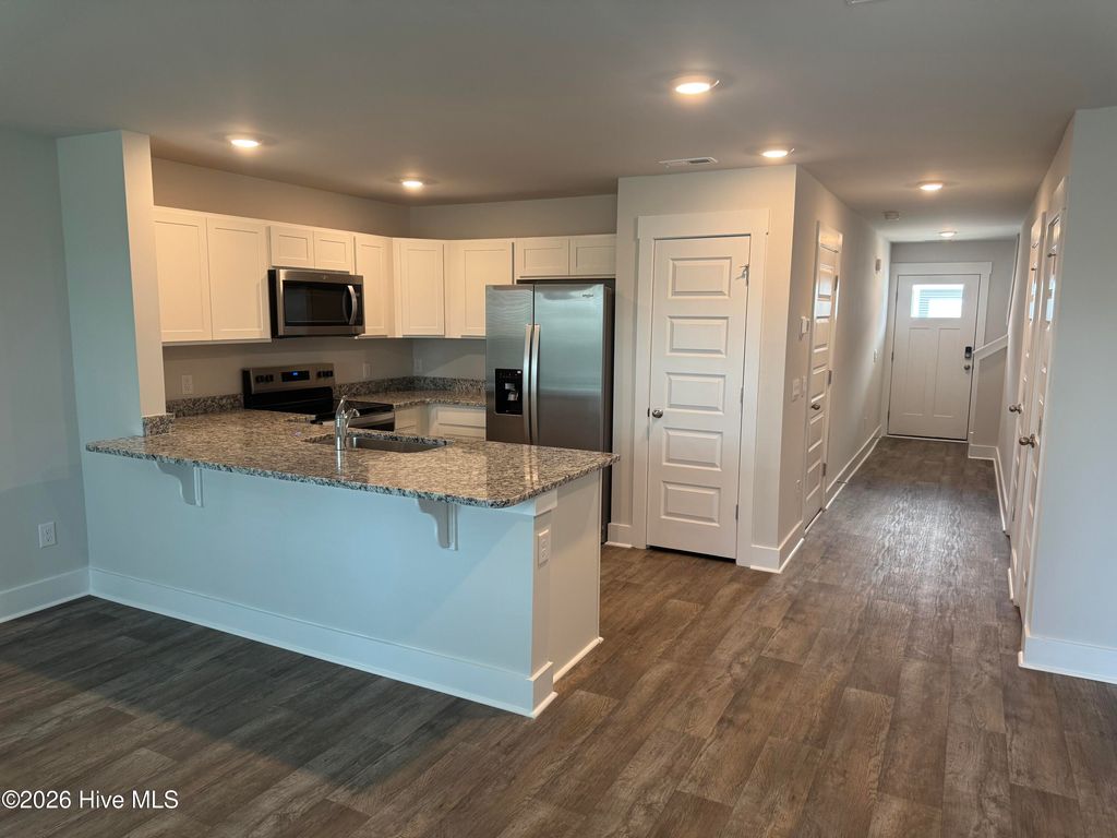 Photo of 102 N Grassland Road #Unit 24, Surf City, NC 28445 (MLS # 100566439)