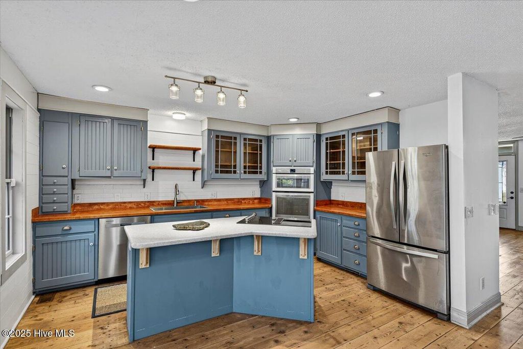 Photo of 645 Boundaryline Drive NW, Calabash, NC 28467 (MLS # 100506546)